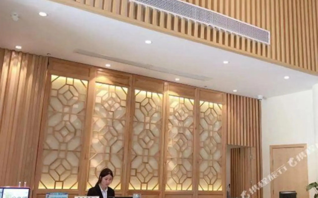 Xinyue Hotel (Liaobu Wanrun Plaza)