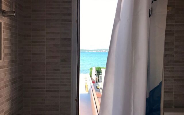 Apartment Petar - 30 m from sandy beach: A1 Nin, Zadar riviera