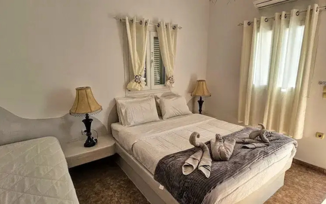 Santorini Studios Pleasure By The Sea
