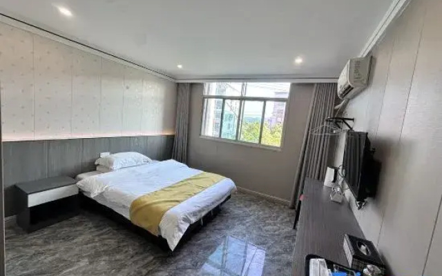 Wanzai Huadu Business Hotel