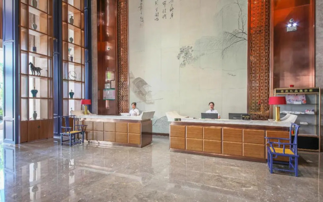 Rezen Heyi Hotel Yizhang