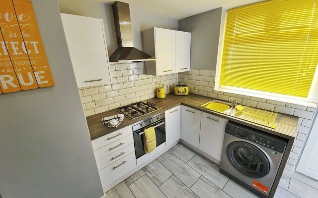 Sunflower Suite under Sasco Apartments