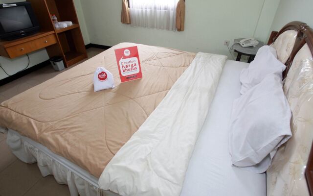 Nida Rooms Purna Mtq