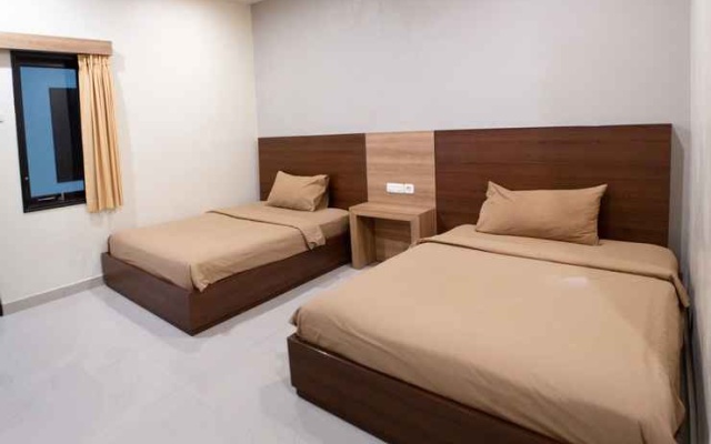 Rajawali Inn – Guest Rooms – Palu