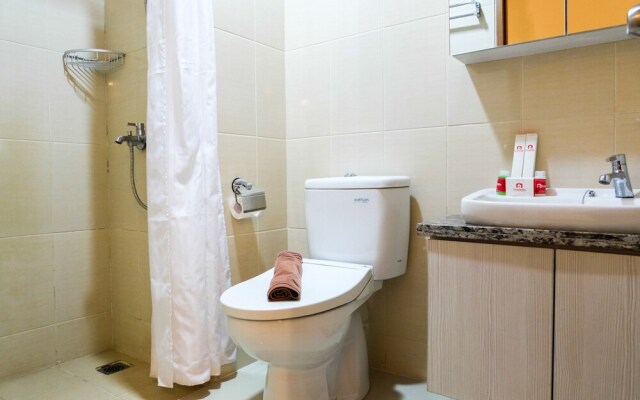 Comfortable Premiere 1BR at The Oasis Apartment