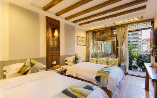 Floral Hotel Lijiang QianlizoudanjiYunju