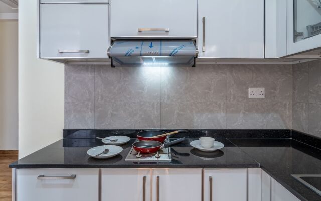 OYO Townhouse 156 Rose Hotel Apartments.