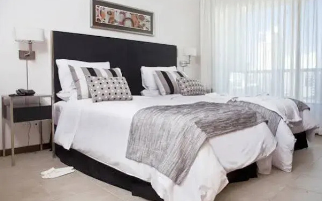 Cetro Real Condominium & Suites