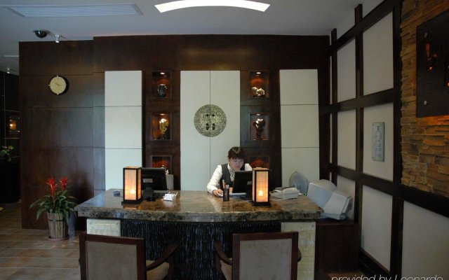 Baolong Homelike Hotel (Wujiaochang Branch)