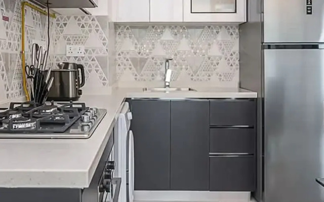 Homesgetaway -spacious 1BR Apt in Pearlz by Danube