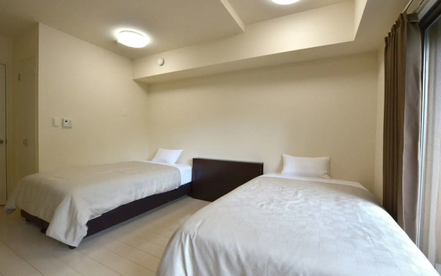 New Station Hotel Residence