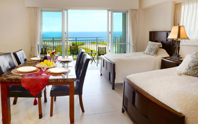 Wisteria Condominium Resort – Guest Rooms – Motobu