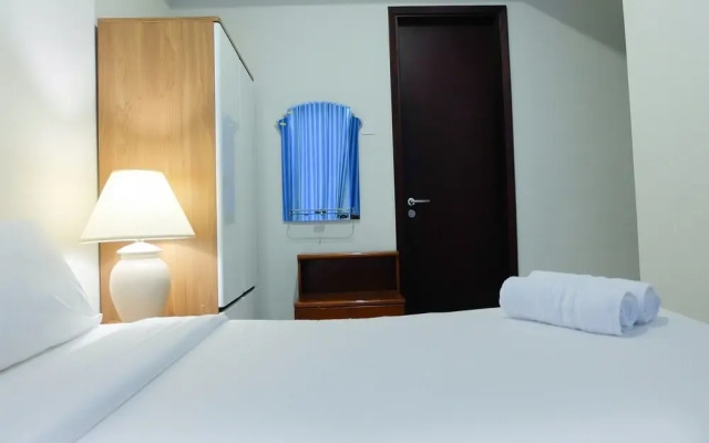 Homey and Modern 2BR Puri Mansion Apartment