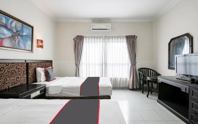 Collection O Senapelan Near Rsud Petala Bumi Formerly De Town Hotel