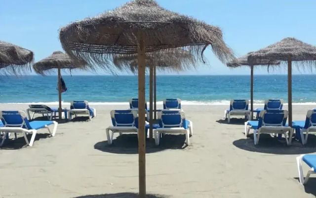 Sun, Sand and a drink in my Hand