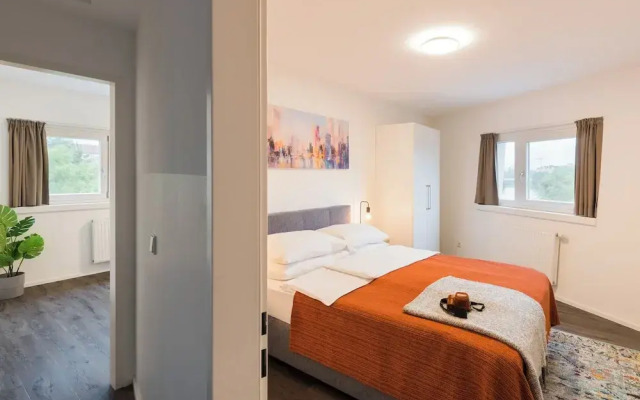 URBAN ISLAND - Riverside Apartments