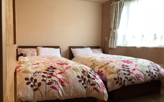 Pension Locomotion – Guest Rooms – Kutchan