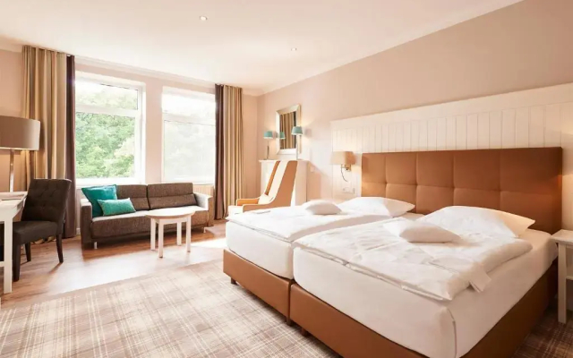 Отель Munte-Wellnesshotel am Stadtwald