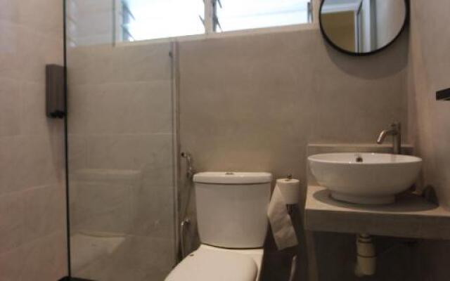 Tung's Tropika - With a Wooden Hut by a Lake