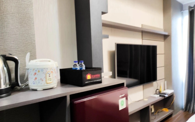 Nice And Elegant Studio At Vida View Makassar Apartment