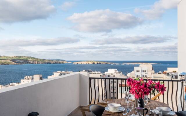 Seashells 2 bedroom Apartment with sunny terrace with stunning panoramic sea views by Getaways Malta