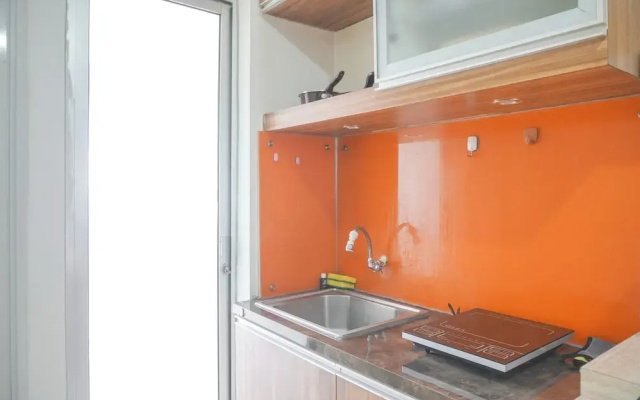 Homey And Strategic 2Br At Bassura City Apartment