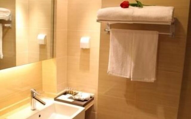 Shenlan Holiday Apartment (Qingdao Thumb Plaza)