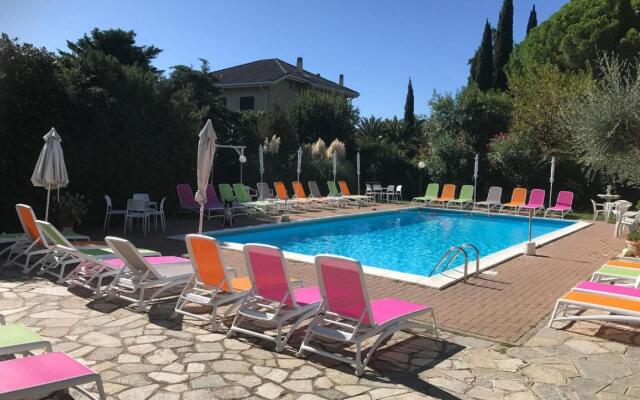 Snug holiday home in Loano with shared pool