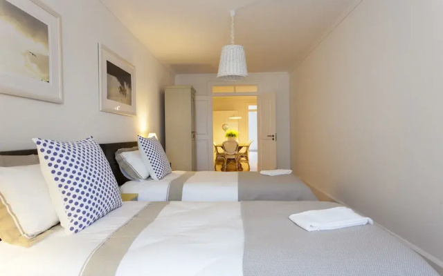 JOIVY Spacious 3BR home w/balcony in Baixa, nearby Lisbon Cathedral
