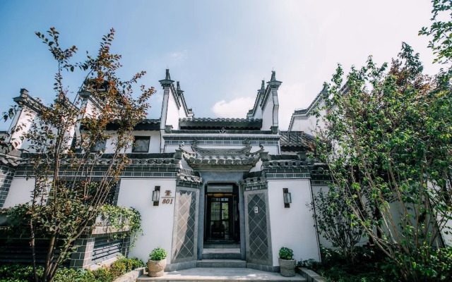 Xinhualian Lv Xin Gu Hotel