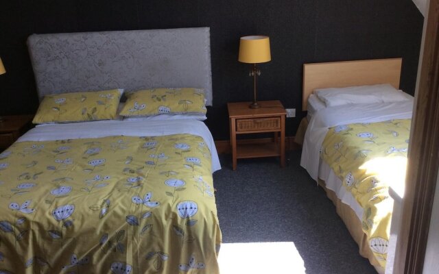 Coach House Suites