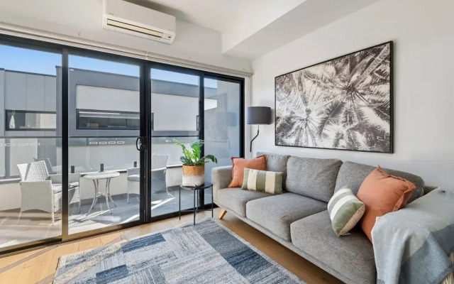 Comfortable 2BR Retreat With Balcony & Parking