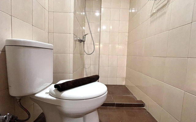 Warm And Homey 2Br At Vida View Makassar Apartment