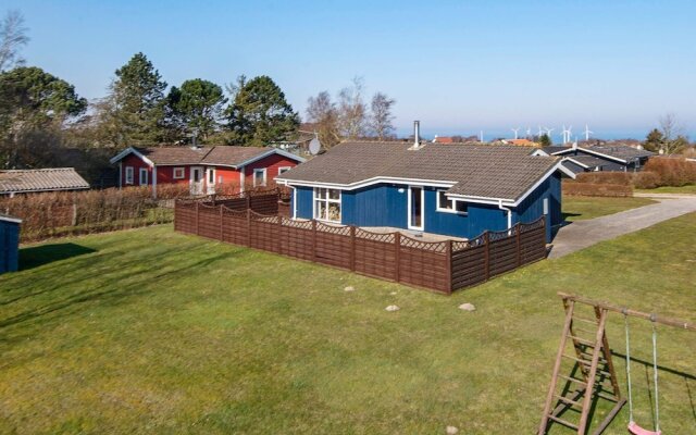 5 person holiday home on a holiday park in Glesborg