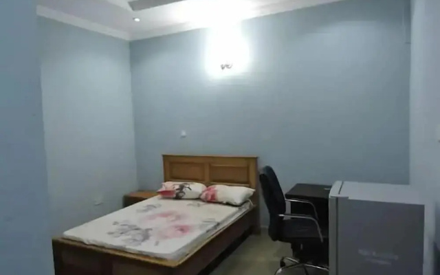 Wig and Gown Apartment