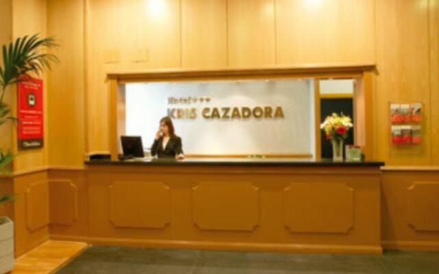 Kris Cazadora