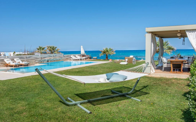 Beachfront Villa Diamond with a heated pool