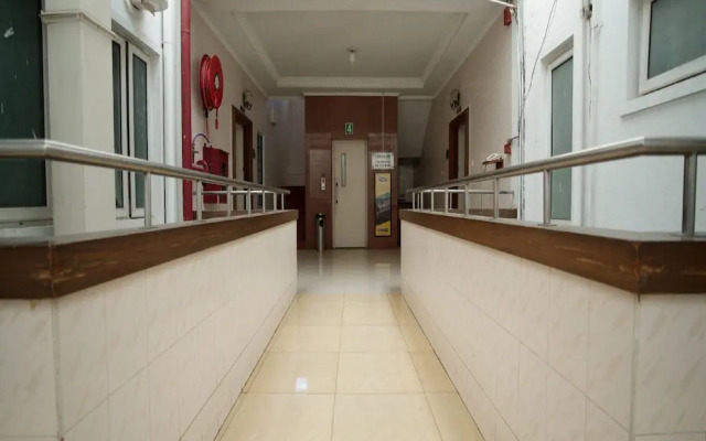 Blossoms Hotel and Service Apartment
