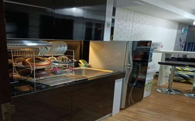 Capital O 93636 La Grande Apartment By UJM