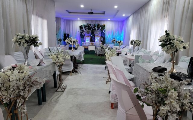The Charis Hotel and Suites