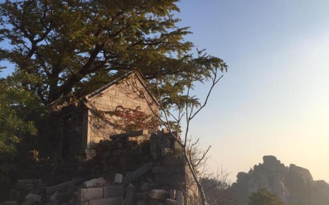 Qingdao Xiufengge Inn