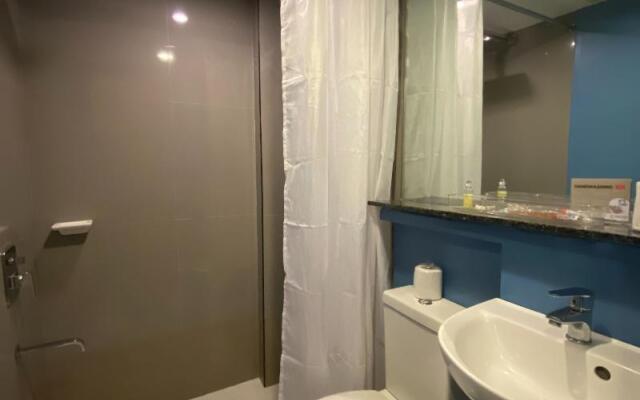 Capital O 820 Guijo Suites Makati