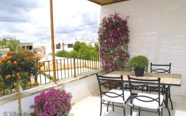 The Courtyard - Lilly