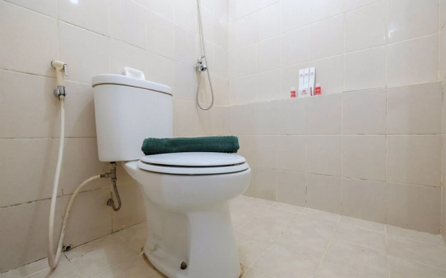 Monochrome Style 2 Bedrooms at Kalibata City Apartment By Travelio