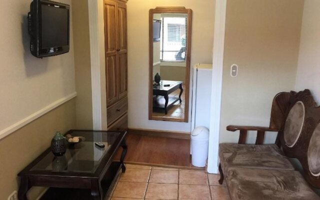 Prado Inn & Suites