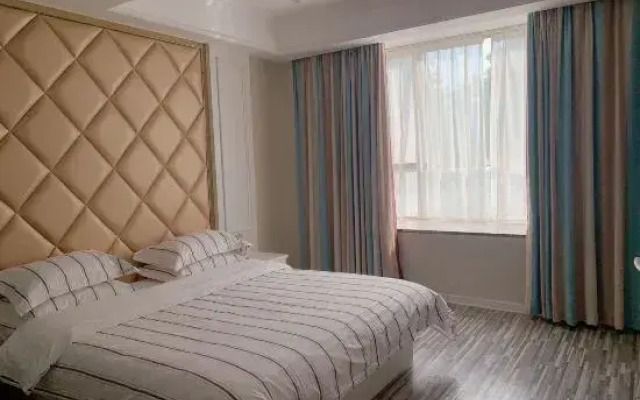 百色小橘子酒店