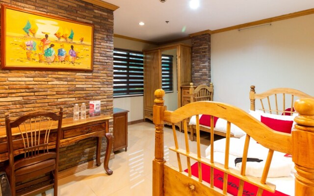 Brickwood Suites by RedDoorz