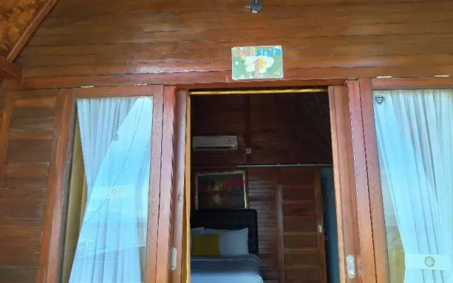 Road Beach Homestay by ZUZU