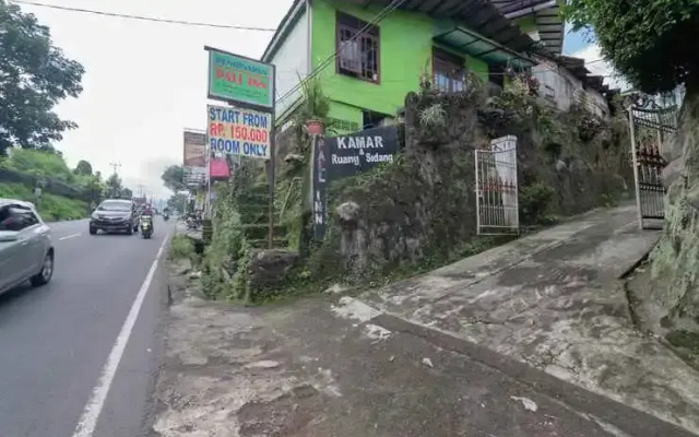 Pall Inn Puncak Mitra RedDoorz