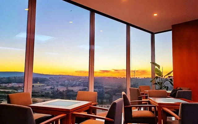 Отель Versatile